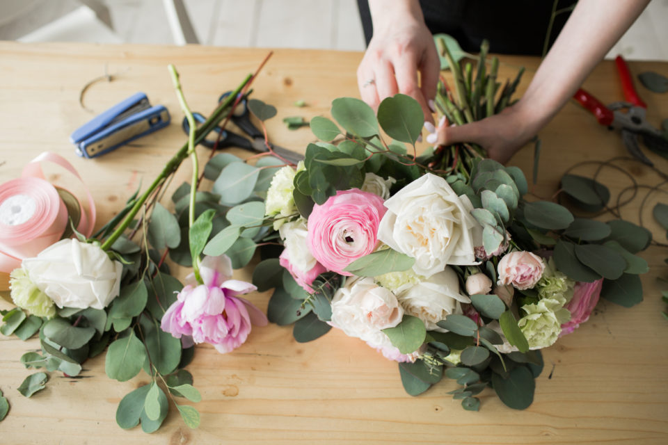 Florist making a flower arrangement