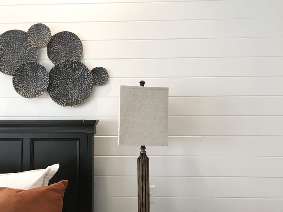 Bedroom with shiplap accent wall