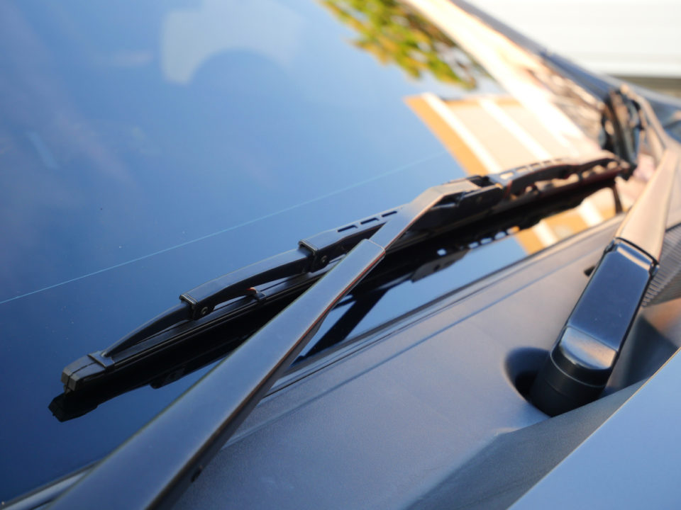 Windshield wipers of a white car