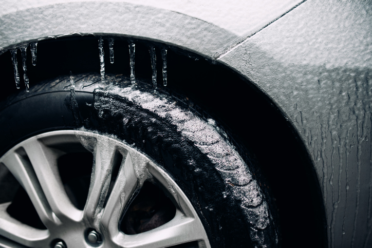 A vehicle coated with a sheet of ice